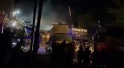 Polisi menembakan gas air mata ke arah pendemo di Kecamatan Tinombo Selatan, Kabupaten Parigi Moutong, Sabtu (12/2/2022) malam/Ist