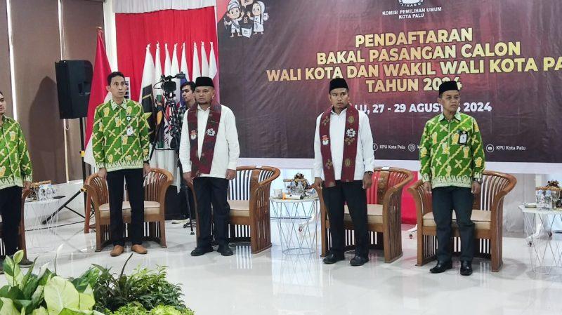 Muhammad J Wartabone-Rizal Dg Sewang resmi mendaftar ke KPU Kota Palu, Kamis (29/8/2024)/hariansulteng