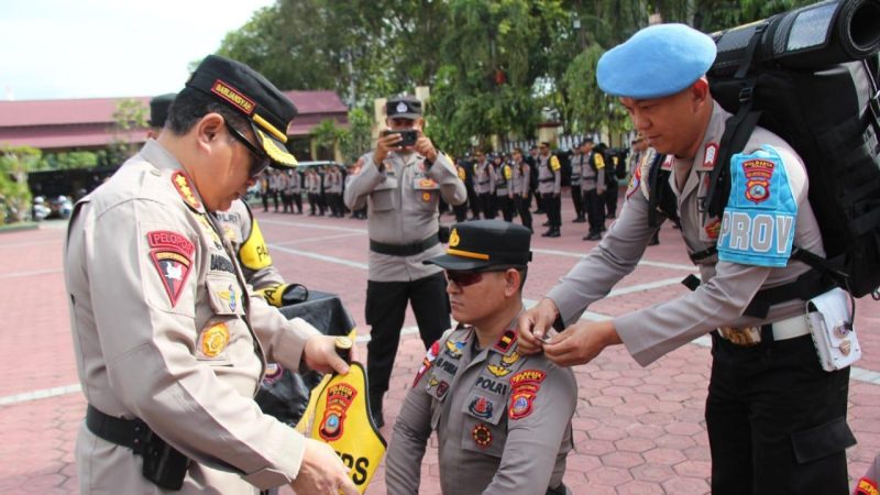 Polresta Palu menggelar apel pergeseran pasukan (Serpas) dalam rangka persiapan pengamanan tempat pemungutan suara (TPS) jelang Pilkada 2024, Minggu (24/11/2024)/Ist