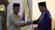 Asisten bidang Perekonomian dan Pembangunan Setda Kota Palu, Rahmat Mustafa melepas 89 calon jemaah haji kloter 12 atau kloter terakhir, Rabu (21/05/2025)/Pemkot Palu