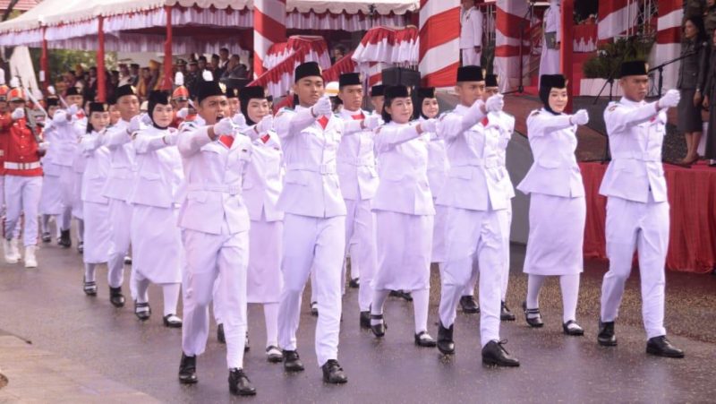 Tim Paskibraka Garuda Perkasa bertugas kibarkan bendera merah putih di Kantor Wali Kota Palu, Minggu (17/8/2025). (Foto: Pemkot Palu)