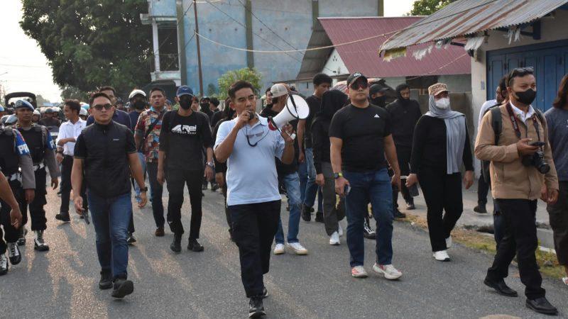 Aparat gabungan menggerebek kawasan yang diduga menjadi lokasi peredaran narkoba di Kelurahan Kayumalue, Kota Palu, Senin (12/10/2026). (Foto: Istimewa)